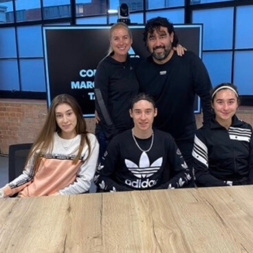 Marcelo Flores with his parents and siblings.